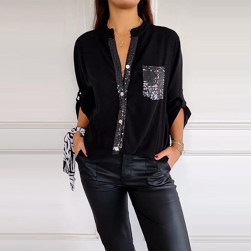 Schwarze Bluse mit glitzernden Details und fließendem Schnitt