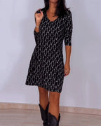 Kariertes Kleid mit V-Ausschnitt und langen Ärmeln