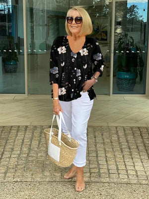 Elegante geblümte Bluse mit lockerem V-Ausschnitt