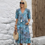 Vestido Midi Animal Print con Bolsillos y Mangas Cortas
