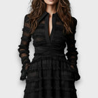 Schwarzes Midikleid mit Fransen und halbtransparenten Lagen