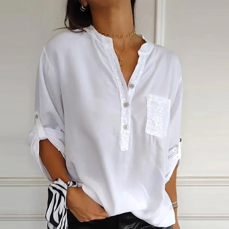 Blusa Negra con Detalles Brillantes de Corte Fluido