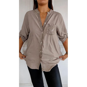 Blusa Negra con Detalles Brillantes de Corte Fluido