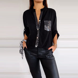 Blusa Negra con Detalles Brillantes de Corte Fluido